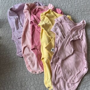 The Honest Company Pink, Yellow, and Purple Bodysuits